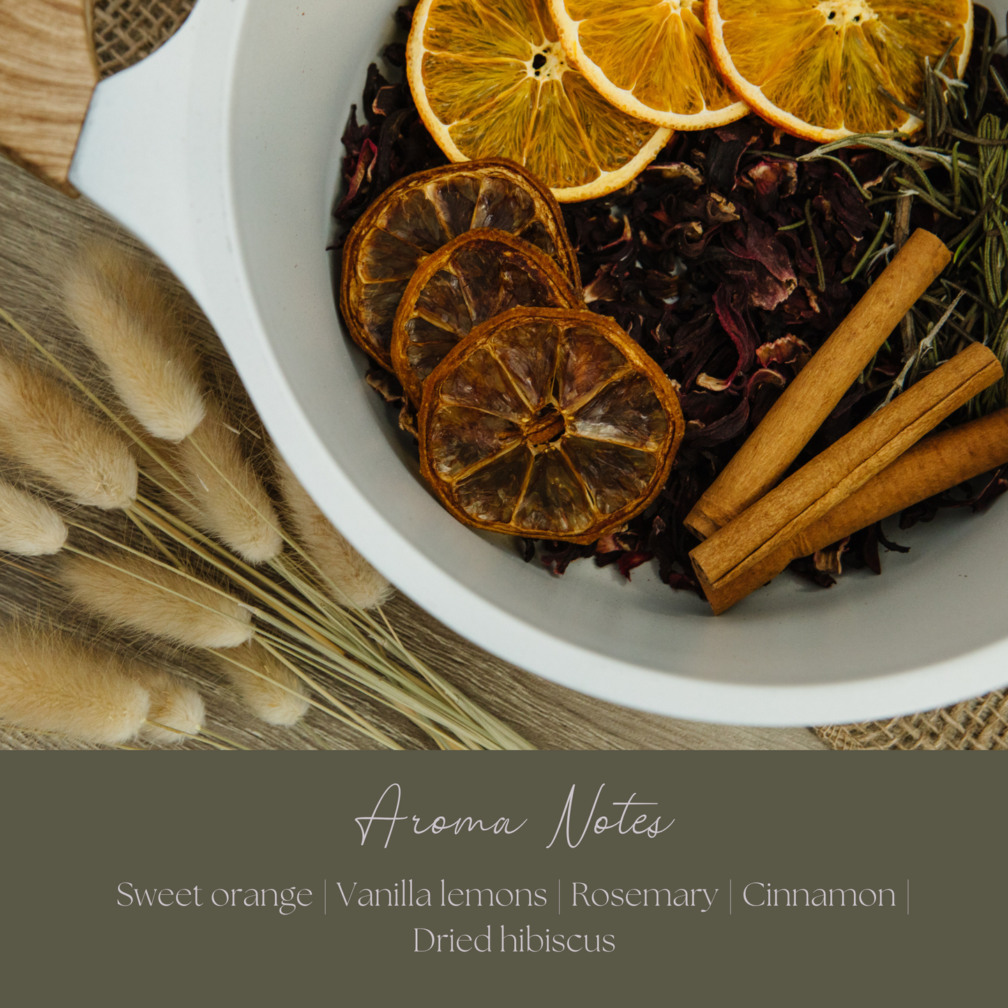 Spice mix with dried oranges, cinnamon sticks, and rosemary in a white bowl on a textured surface.